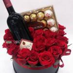 Red and white fancy box with wine chocolate
